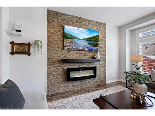 39 Weathering Heights, Stoney Creek, ON - Indoor Photo Showing Living Room With Fireplace