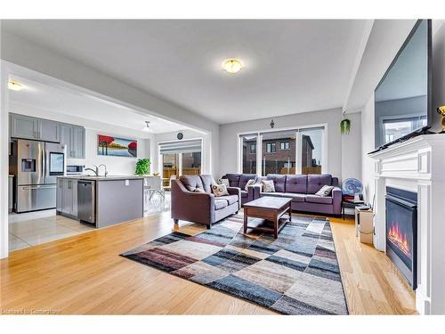 530 Thompson Street, Woodstock, ON - Indoor Photo Showing Living Room With Fireplace