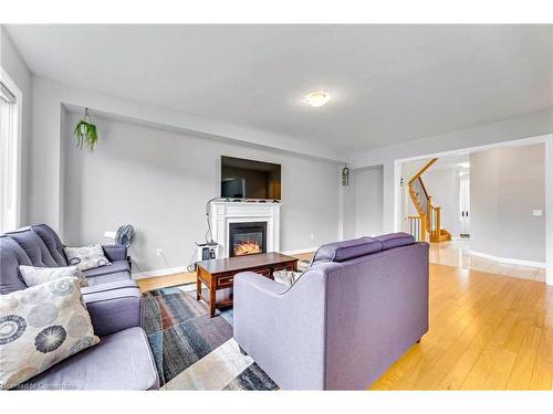 530 Thompson Street, Woodstock, ON - Indoor Photo Showing Living Room With Fireplace