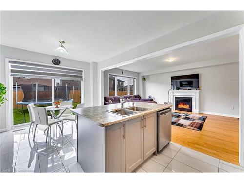 530 Thompson Street, Woodstock, ON - Indoor Photo Showing Kitchen With Fireplace With Double Sink