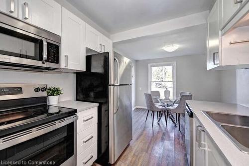 144 Greendale Crescent, Kitchener, ON - Indoor Photo Showing Kitchen With Stainless Steel Kitchen With Double Sink