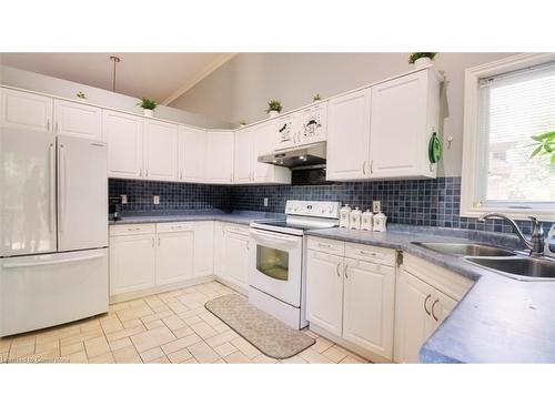 1085 South Wenige Drive, London, ON - Indoor Photo Showing Kitchen With Double Sink