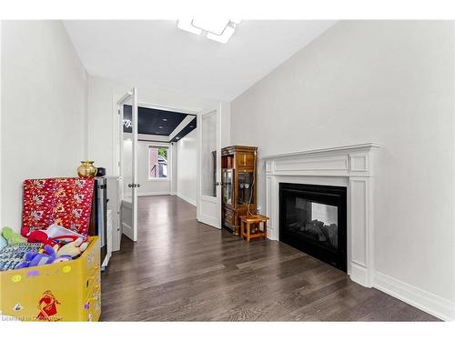 125 Prince Charles Crescent, Woodstock, ON - Indoor Photo Showing Living Room With Fireplace