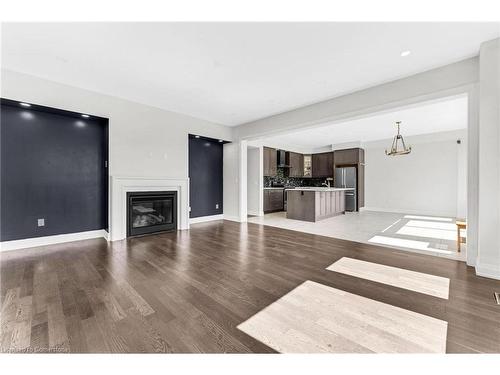 125 Prince Charles Crescent, Woodstock, ON - Indoor Photo Showing Living Room With Fireplace