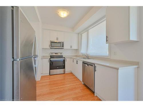 111-9470 The Gore Road, Brampton, ON - Indoor Photo Showing Kitchen With Double Sink