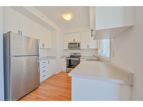 111-9470 The Gore Road, Brampton, ON - Indoor Photo Showing Kitchen With Double Sink