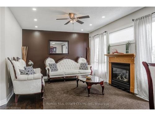 1634 Chelton Place, London, ON - Indoor Photo Showing Living Room With Fireplace