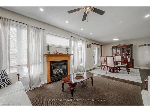 1634 Chelton Place, London, ON - Indoor Photo Showing Living Room With Fireplace