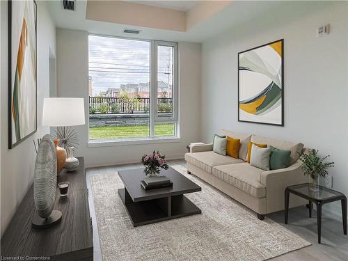 107-1440 Clarriage Court, Milton, ON - Indoor Photo Showing Living Room