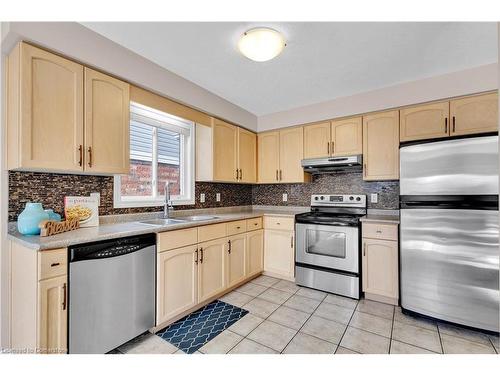 21 Henderson Drive, Guelph, ON - Indoor Photo Showing Kitchen With Double Sink