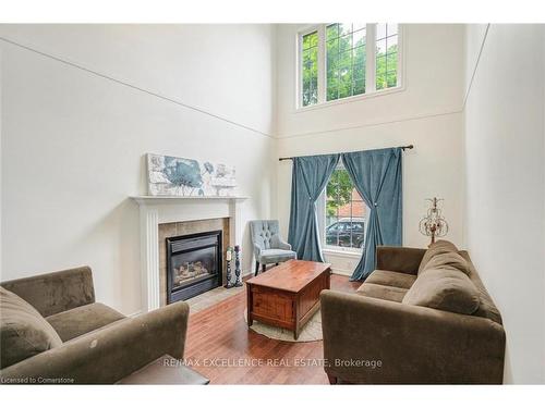 59-1100 Byron Baseline Road, London, ON - Indoor Photo Showing Living Room With Fireplace