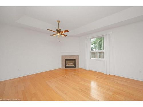 28-11 Twentyplace Boulevard, Mount Hope, ON - Indoor Photo Showing Other Room With Fireplace