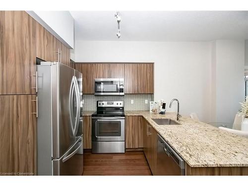 1106-65 Speers Road, Oakville, ON - Indoor Photo Showing Kitchen With Stainless Steel Kitchen