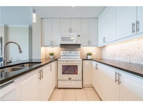 906-50 Hall Road, Georgetown, ON - Indoor Photo Showing Kitchen With Double Sink