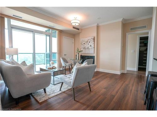 906-50 Hall Road, Georgetown, ON - Indoor Photo Showing Living Room With Fireplace