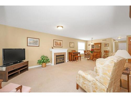 122 Milligan Street, Fergus, ON - Indoor Photo Showing Living Room With Fireplace