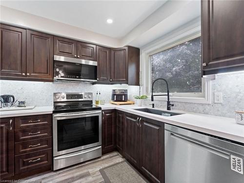 4 Greengrove Way, Whitby, ON - Indoor Photo Showing Kitchen With Stainless Steel Kitchen With Double Sink With Upgraded Kitchen