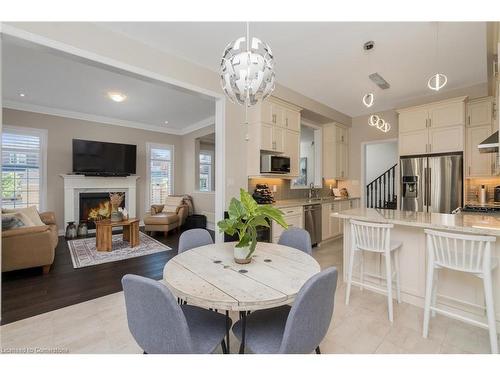 159 Morningside Drive, Georgetown, ON - Indoor Photo Showing Dining Room With Fireplace