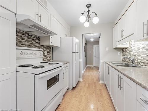 1403-61 Richview Road, Toronto, ON - Indoor Photo Showing Kitchen With Double Sink