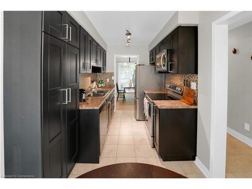 12-2915 Headon Forest Drive, Burlington, ON - Indoor Photo Showing Kitchen With Double Sink