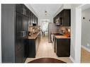 12-2915 Headon Forest Drive, Burlington, ON  - Indoor Photo Showing Kitchen With Double Sink 