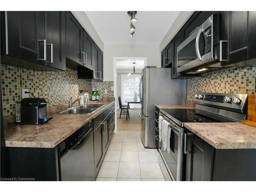 12-2915 Headon Forest Drive, Burlington, ON - Indoor Photo Showing Kitchen With Double Sink With Upgraded Kitchen