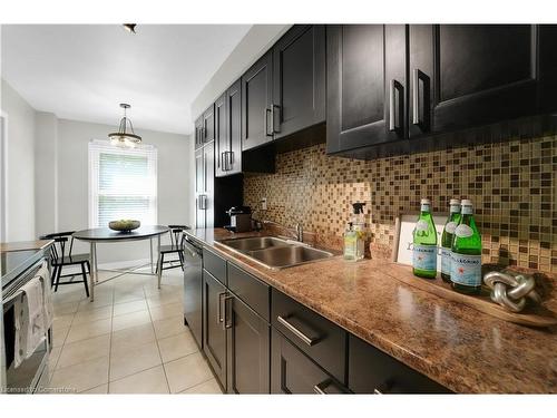 12-2915 Headon Forest Drive, Burlington, ON - Indoor Photo Showing Kitchen With Double Sink