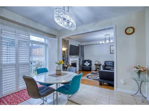 667 Linden Drive Drive, Cambridge, ON - Indoor Photo Showing Dining Room With Fireplace