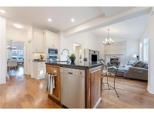 16 Edmonton Street, Brampton, ON - Indoor Photo Showing Kitchen With Fireplace