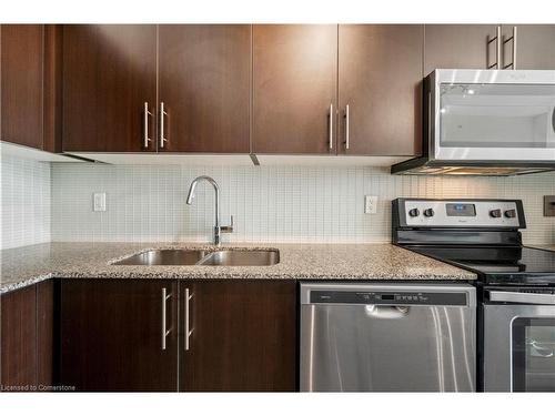 708-55 Speers Road, Oakville, ON - Indoor Photo Showing Kitchen With Double Sink With Upgraded Kitchen