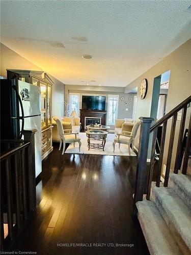 167 Sims Estate Drive, Kitchener, ON - Indoor Photo Showing Living Room With Fireplace