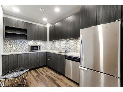 1316-30 Shore Breeze Drive Drive, Toronto, ON - Indoor Photo Showing Kitchen With Stainless Steel Kitchen With Double Sink With Upgraded Kitchen