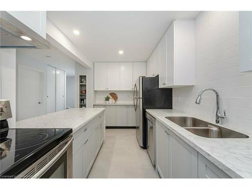 57-6779 Glen Erin Drive, Mississauga, ON - Indoor Photo Showing Kitchen With Double Sink