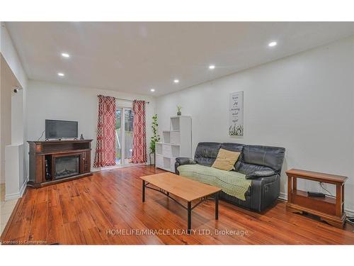 59 Kendrick Court, Hamilton, ON - Indoor Photo Showing Living Room With Fireplace