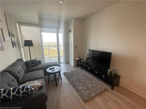 B906-3200 Dakota Common, Burlington, ON - Indoor Photo Showing Living Room