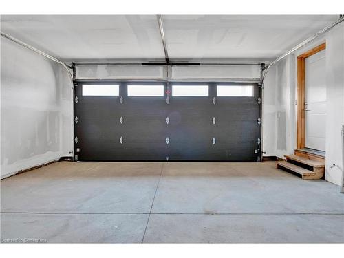 183 Longboat Run, Brantford, ON - Indoor Photo Showing Garage