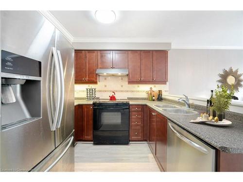 1063 Zimmerman Crescent, Milton, ON - Indoor Photo Showing Kitchen With Double Sink