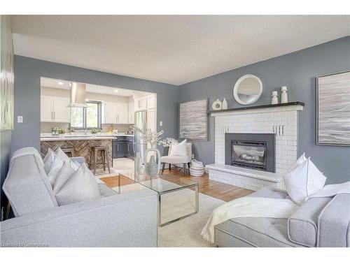 50 Bechtel Street, Cambridge, ON - Indoor Photo Showing Living Room With Fireplace