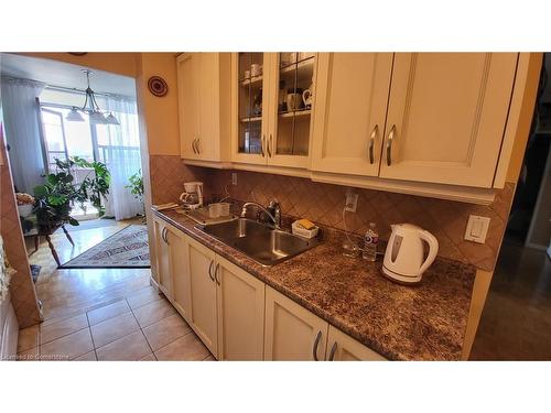 912-5 Frith Road, Toronto, ON - Indoor Photo Showing Kitchen With Double Sink