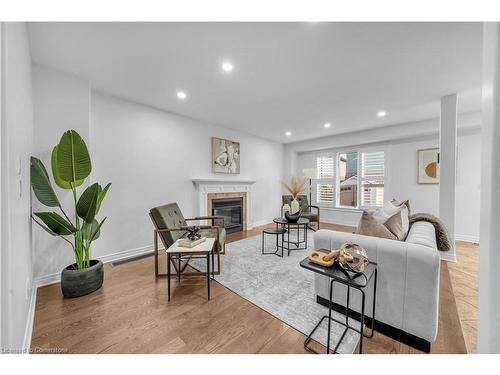 8412 Eva Boulevard, Niagara Falls, ON - Indoor Photo Showing Living Room With Fireplace