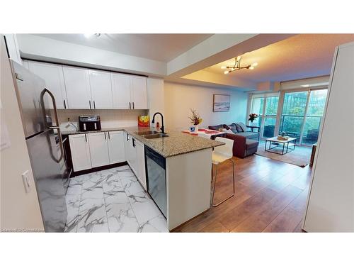 206-525 Wilson Avenue, Toronto, ON - Indoor Photo Showing Kitchen With Double Sink