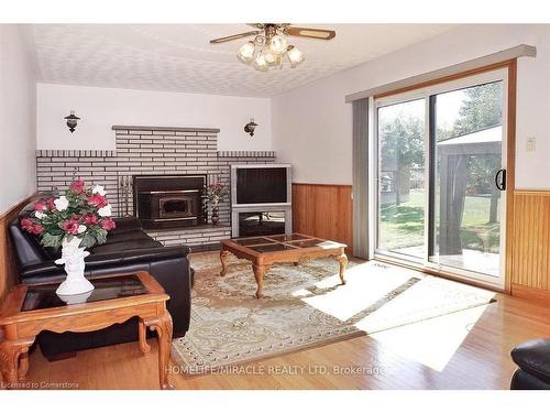 93 Old Chicopee Drive, Kitchener, ON - Indoor Photo Showing Living Room With Fireplace