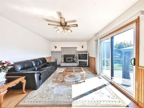 93 Old Chicopee Drive, Kitchener, ON - Indoor Photo Showing Living Room With Fireplace