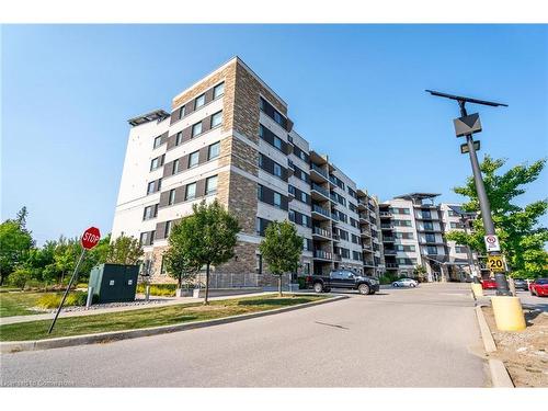 208-33 Whitmer Street, Milton, ON - Outdoor With Facade