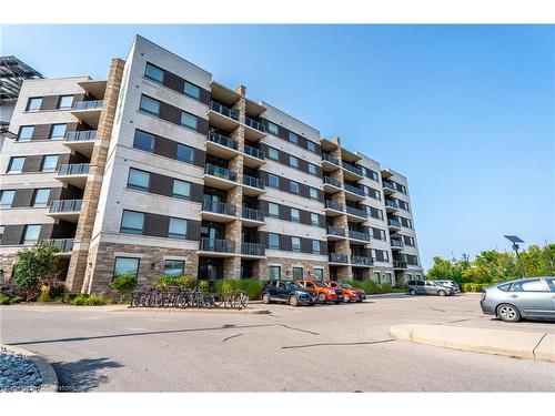 208-33 Whitmer Street, Milton, ON - Outdoor With Facade