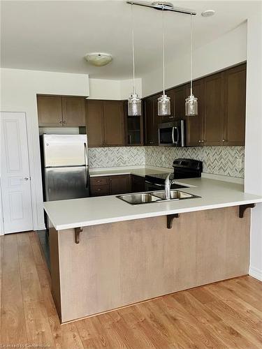 16-515 Winston Road, Grimsby, ON - Indoor Photo Showing Kitchen With Double Sink