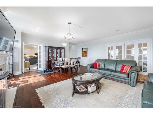 2808-25 Kingsbridge Garden Circle, Mississauga, ON - Indoor Photo Showing Living Room With Fireplace