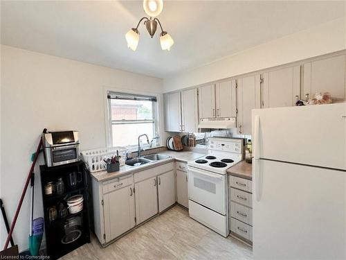 630 Fennell Avenue, Hamilton, ON - Indoor Photo Showing Kitchen With Double Sink