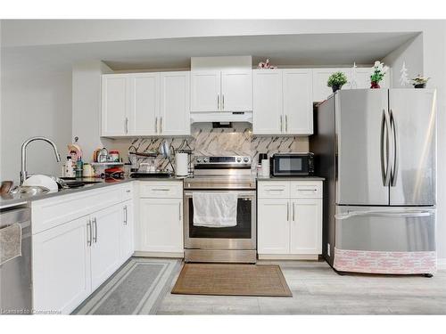 6-720 Grey Street, Brantford, ON - Indoor Photo Showing Kitchen With Double Sink