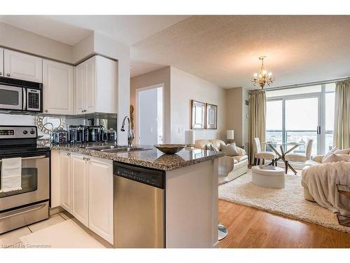 1701-4889 Kimbermount Avenue, Mississauga, ON - Indoor Photo Showing Kitchen With Stainless Steel Kitchen With Double Sink